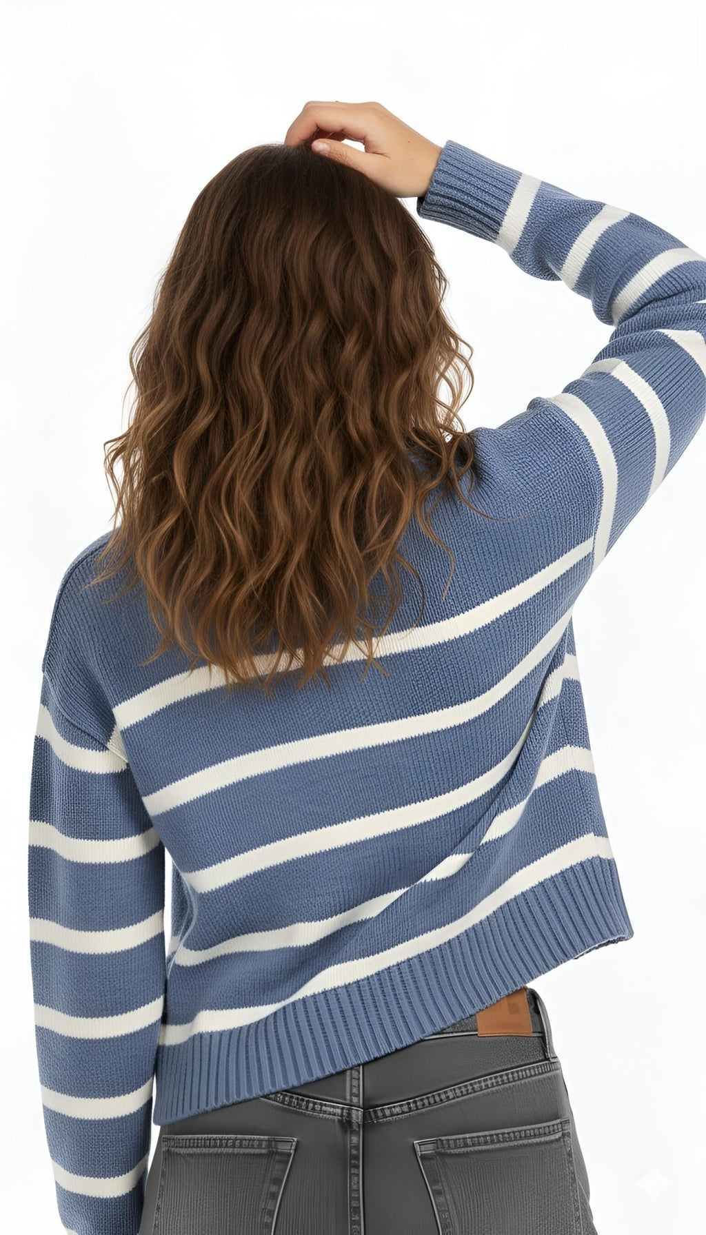 Person wearing a blue and white striped sweater on a white background